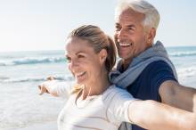 A man and a woman on the beach together