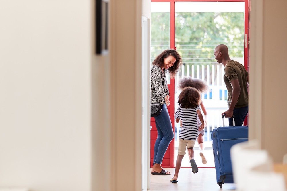 Family walking into vacation rental