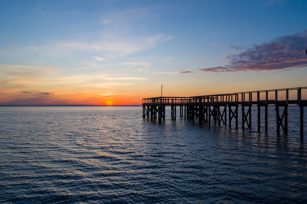 A pier on Mobile Bay, Alabama at sunset