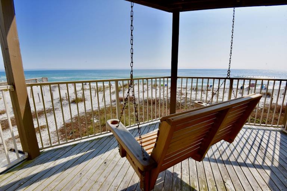porch swing at a beach vacation rental overlooking the Gulf 